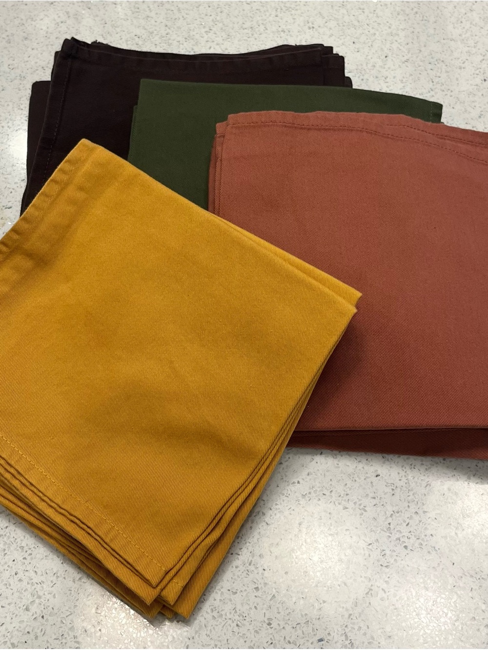Set of Solid Cotton Napkins in Mustard, Terracotta, Olive, and Chocolate